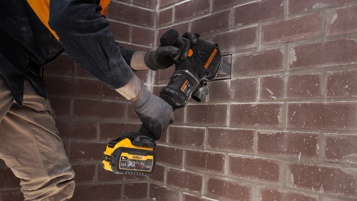 Arbortech Allsaw cutting mortar in a brick wall to remove a single brick with no over-cutting