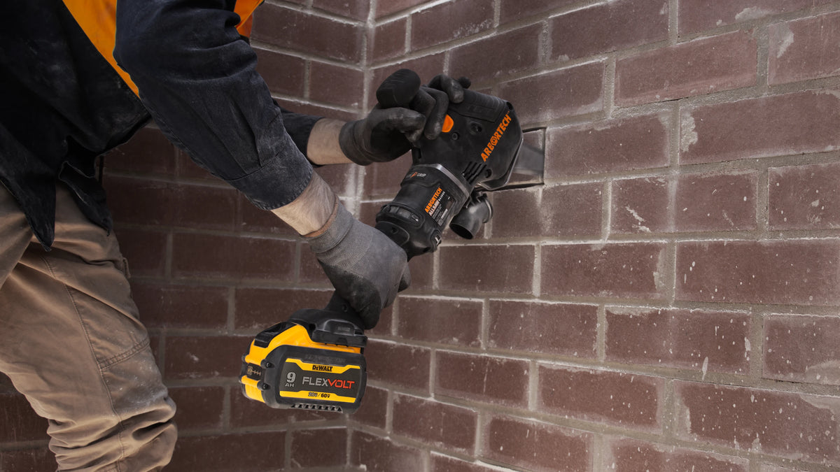 Arbortech Allsaw cutting mortar in a brick wall to remove a single brick with no over-cutting