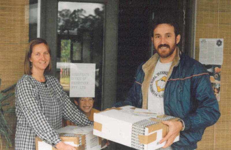 Kristine, Kevin and their son preparing the first order bound to the US