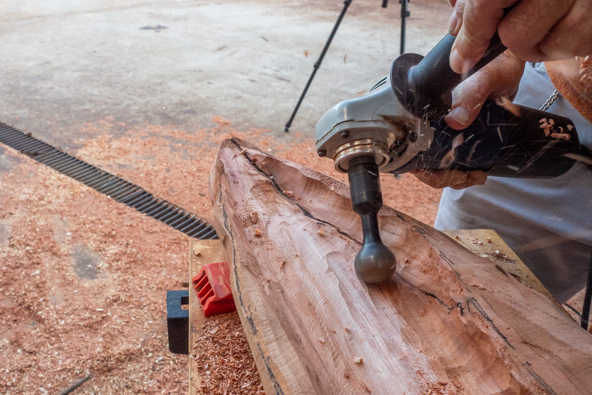 Sculpting a long live-edge timber trough with an Arbortech carving attachment
